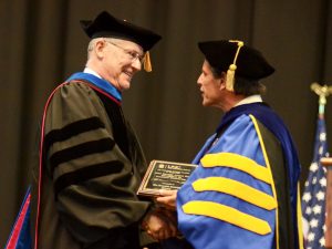 Donald J. Raleigh receiving the Faculty Award for Excellence in Doctoral Mentoring from Graduate School Dean Steve Matson