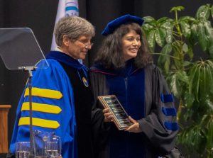 Graduate School Dean Steve Matson presents the 2018 Faculty Award for Excellence in Doctoral Mentoring to Blossom Damania